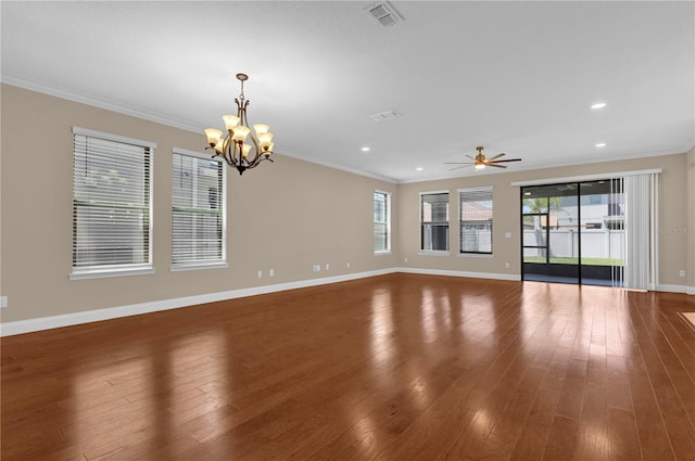 8348 Vivaro Isle Way, Windermere, FL 34786 - spare room featuring a chandelier, baseboards, wood finished floors, a ceiling fan, and crown molding
