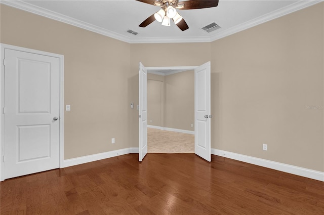 8348 Vivaro Isle Way, Windermere, FL 34786 - unfurnished bedroom with ornamental molding, wood finished floors, baseboards, and a ceiling fan