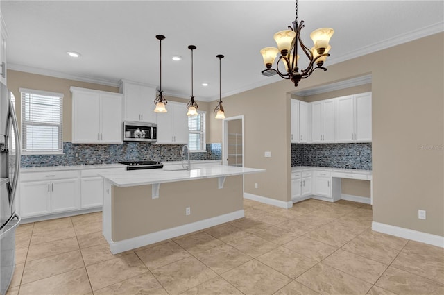 8348 Vivaro Isle Way, Windermere, FL 34786 - kitchen with stainless steel appliances, a sink, backsplash, light tile patterned floors, and a chandelier
