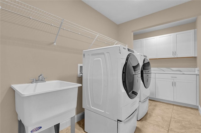 8348 Vivaro Isle Way, Windermere, FL 34786 - laundry area with independent washer and dryer and cabinet space