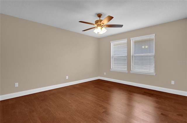 8348 Vivaro Isle Way, Windermere, FL 34786 - spare room featuring baseboards, wood finished floors, and ceiling fan