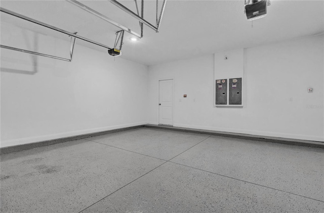 8348 Vivaro Isle Way, Windermere, FL 34786 - garage with a garage door opener, electric panel, and baseboards