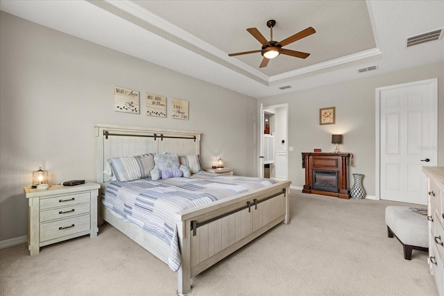 9846 SW 106th Ct, Ocala, F, Ocala, FL 34481 - bedroom with a tray ceiling, light colored carpet, crown molding, and a ceiling fan