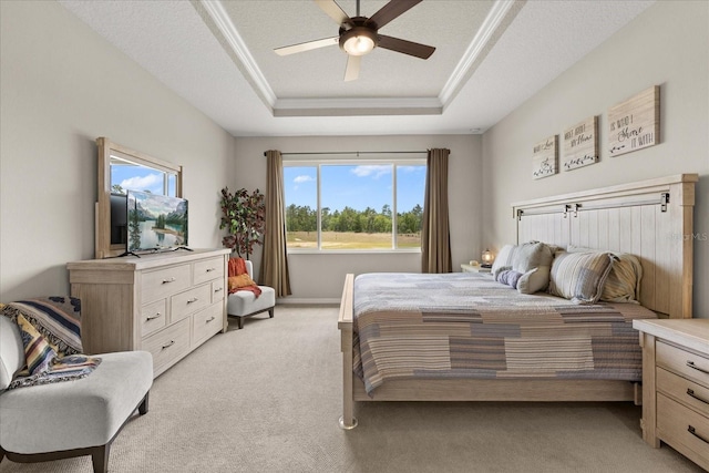 9846 SW 106th Ct, Ocala, F, Ocala, FL 34481 - bedroom featuring a raised ceiling, light colored carpet, and a ceiling fan