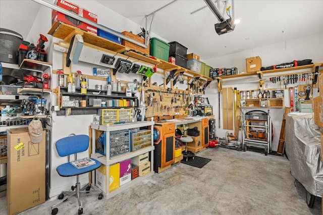 9846 SW 106th Ct, Ocala, F, Ocala, FL 34481 - garage featuring a workshop area and a garage door opener