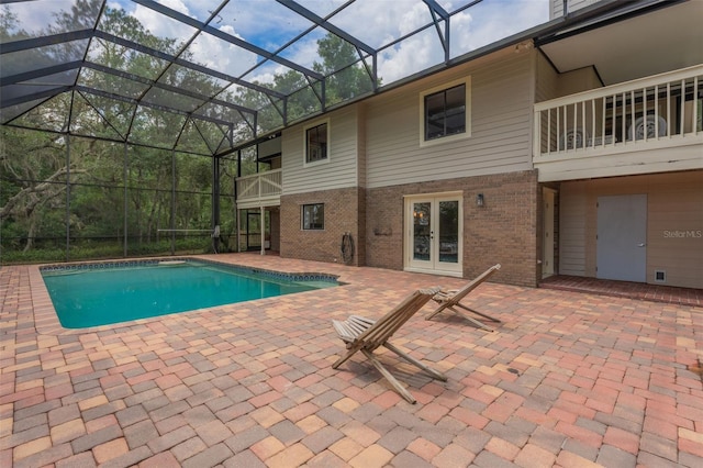 120 E Greentree Ln, Lake Mary, FL 32746 - swimming pool with french doors, a patio area, and a lanai