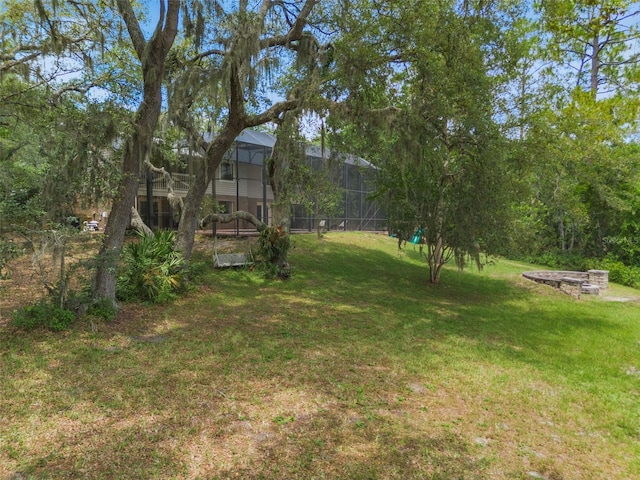 120 E Greentree Ln, Lake Mary, FL 32746 - view of grassy yard with glass enclosure