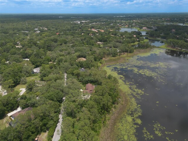 120 E Greentree Ln, Lake Mary, FL 32746 - aerial view of property's location with a nearby body of water and a heavily wooded area