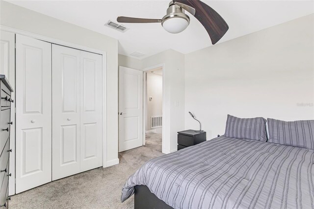 15096 Chapter Way, Winter Garden, FL 34787 - carpeted bedroom with a closet, a ceiling fan, and baseboards