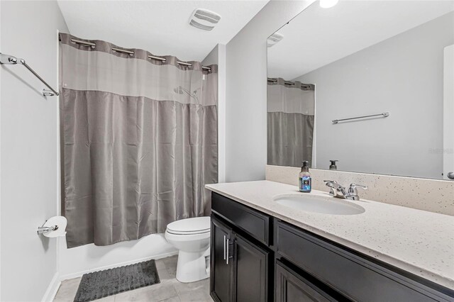 15096 Chapter Way, Winter Garden, FL 34787 - full bath with vanity, toilet, shower / bath combo, and tile patterned flooring
