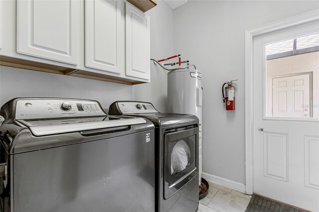 15096 Chapter Way, Winter Garden, FL 34787 - laundry area with cabinet space, washing machine and clothes dryer, and baseboards