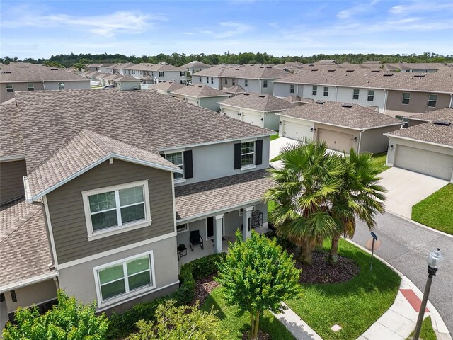 15096 Chapter Way, Winter Garden, FL 34787 - view of front of property featuring a residential view, stucco siding, roof with shingles, and concrete driveway
