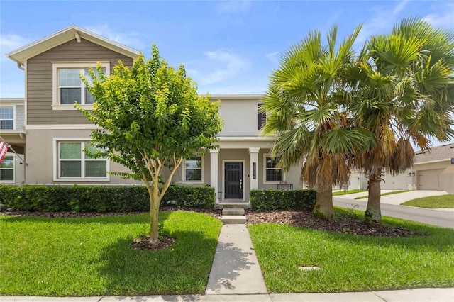 15096 Chapter Way, Winter Garden, FL 34787 - view of front facade featuring stucco siding and a front yard