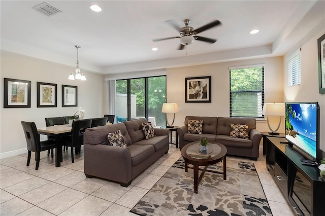 8219 Roseville Blvd, Davenport, FL 33896 - living room with plenty of natural light, a chandelier, light tile patterned floors, and recessed lighting