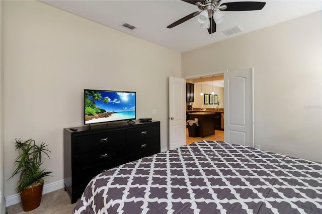 8219 Roseville Blvd, Davenport, FL 33896 - bedroom with baseboards, a ceiling fan, and connected bathroom