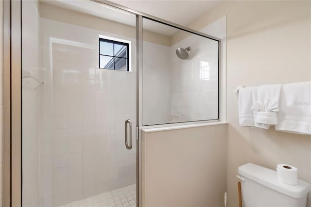 8219 Roseville Blvd, Davenport, FL 33896 - bathroom featuring toilet and a stall shower