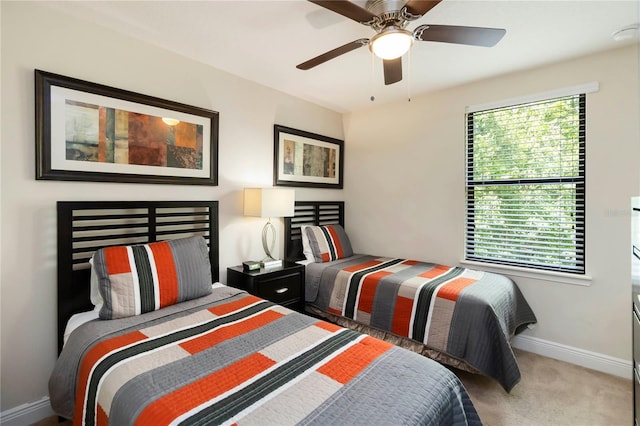8219 Roseville Blvd, Davenport, FL 33896 - bedroom with baseboards, carpet floors, and ceiling fan