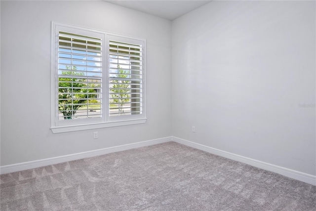 13323 Panama Beach Ct, Orlando, FL 32827 - carpeted spare room with baseboards