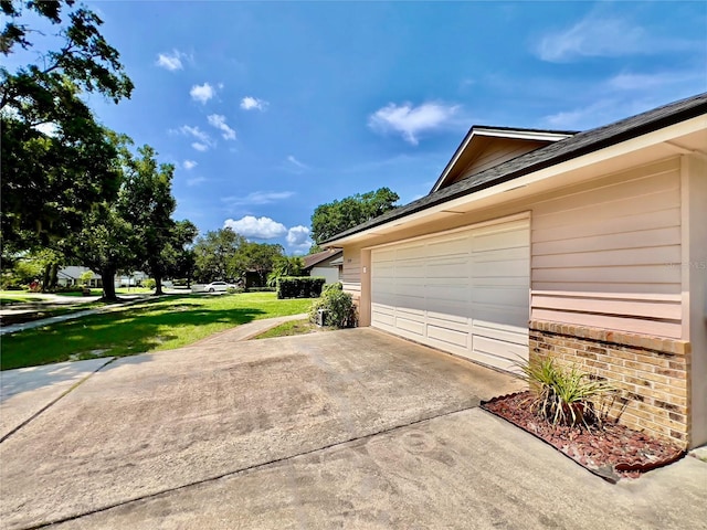 5724 Pitch Pine Dr, Orlando, FL 32819 - garage with concrete driveway