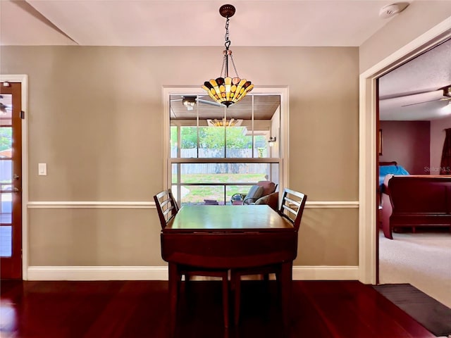 5724 Pitch Pine Dr, Orlando, FL 32819 - dining room featuring baseboards and ceiling fan