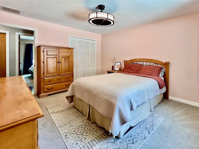 5724 Pitch Pine Dr, Orlando, FL 32819 - bedroom with light colored carpet and a closet