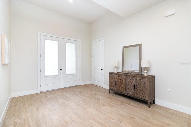 508 Topsail Dr, Rockledge, FL 32955 - entrance foyer with light wood-type flooring and french doors