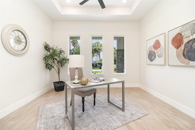 508 Topsail Dr, Rockledge, FL 32955 - office area with a tray ceiling, light wood finished floors, ceiling fan, and recessed lighting