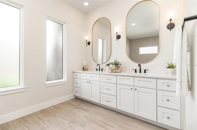 508 Topsail Dr, Rockledge, FL 32955 - full bath featuring double vanity, plenty of natural light, and recessed lighting