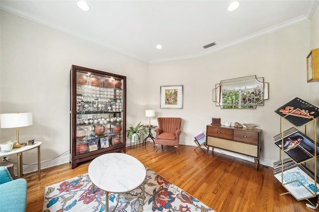 1420 Palmer Ave, Winter Park, FL 32789 - living area featuring wood finished floors, recessed lighting, crown molding, and baseboards