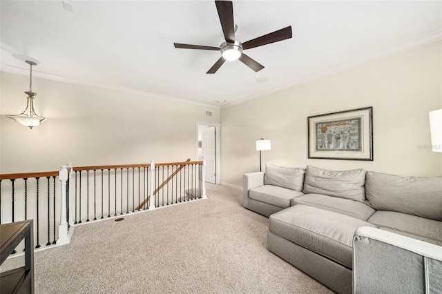 1420 Palmer Ave, Winter Park, FL 32789 - carpeted living room featuring ceiling fan, ornamental molding, and baseboards