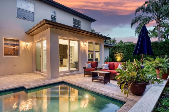 1420 Palmer Ave, Winter Park, FL 32789 - back of house with stucco siding, a patio area, an outdoor pool, and outdoor lounge area