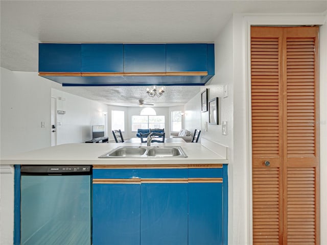 2729 N Poinciana Blvd Unit 125, Kissimmee, FL 34746 - kitchen with dishwashing machine, a sink, blue cabinetry, open floor plan, and light countertops