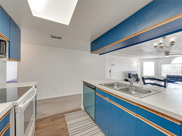 2729 N Poinciana Blvd Unit 125, Kissimmee, FL 34746 - kitchen featuring a sink, dishwasher, blue cabinetry, a chandelier, and dark wood-style floors