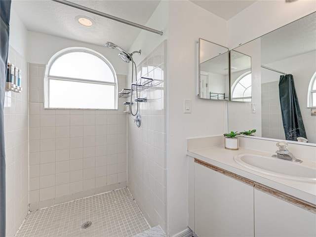 2729 N Poinciana Blvd Unit 125, Kissimmee, FL 34746 - bathroom with tiled shower and vanity