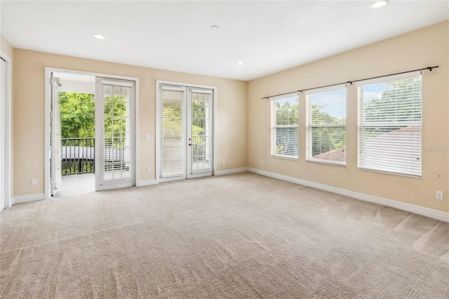 1429 Arbitus Cir, Oviedo, FL 32765 - spare room featuring baseboards, light carpet, and recessed lighting