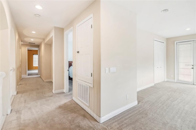 1429 Arbitus Cir, Oviedo, FL 32765 - hallway with light colored carpet, baseboards, and recessed lighting