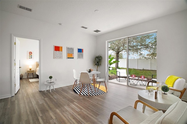 2306 Valhalla Dr, Tavares, FL 32778 - sitting room with wood finished floors and baseboards