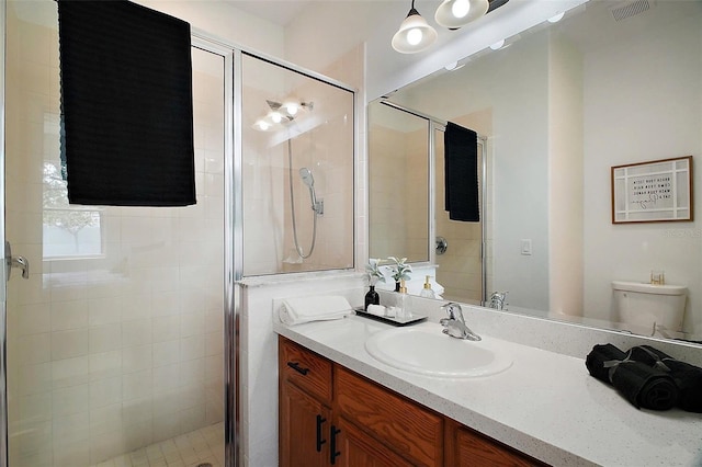 2306 Valhalla Dr, Tavares, FL 32778 - bathroom with a stall shower, vanity, and toilet