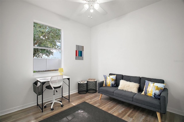 2306 Valhalla Dr, Tavares, FL 32778 - office area featuring wood finished floors, a ceiling fan, and baseboards