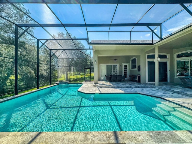 3216 Rolling Hills Ln, Apopka, FL 32712 - outdoor pool with ceiling fan, a patio area, and glass enclosure
