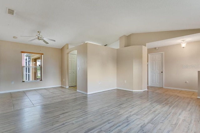 2772 Pelham Cir, Deltona, FL 32738 - unfurnished room featuring vaulted ceiling, ceiling fan, light wood finished floors, and baseboards