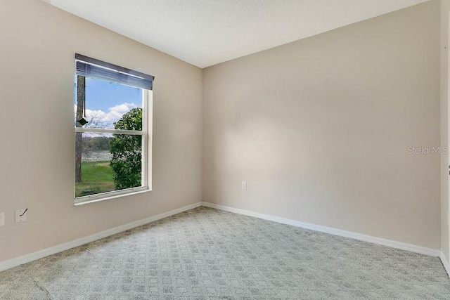 2772 Pelham Cir, Deltona, FL 32738 - unfurnished room with carpet floors and baseboards