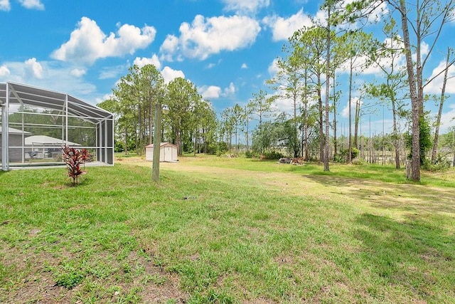 2772 Pelham Cir, Deltona, FL 32738 - view of grassy yard with a lanai