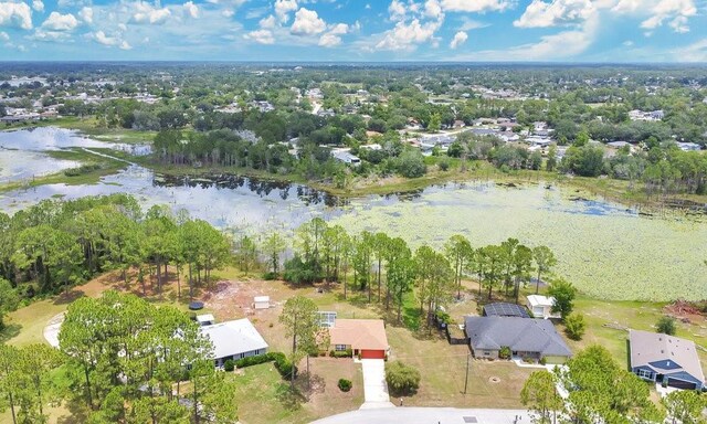 2772 Pelham Cir, Deltona, FL 32738 - aerial perspective of suburban area with a large body of water