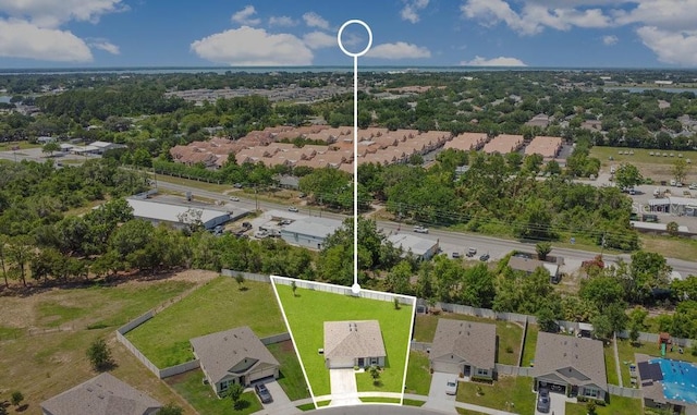 2668 Grand Central Ave, Tavares, FL 32778 - aerial perspective of suburban area featuring property parcel outlined