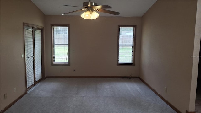 900 Red Fox Rd, Altamonte Springs, FL 32714 - unfurnished bedroom with light carpet, baseboards, a closet, and a ceiling fan
