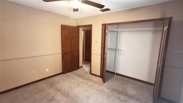 900 Red Fox Rd, Altamonte Springs, FL 32714 - unfurnished bedroom with light colored carpet, a closet, ceiling fan, and baseboards