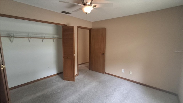 900 Red Fox Rd, Altamonte Springs, FL 32714 - unfurnished bedroom with a closet, carpet floors, baseboards, and a ceiling fan