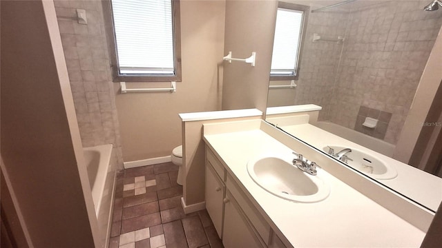 900 Red Fox Rd, Altamonte Springs, FL 32714 - full bath featuring vanity, toilet, bathtub / shower combination, baseboards, and tile patterned flooring