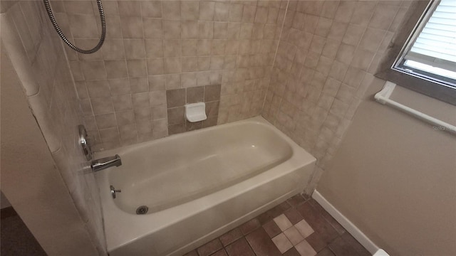 900 Red Fox Rd, Altamonte Springs, FL 32714 - full bath featuring baseboards and washtub / shower combination